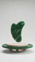outil gua sha sculpté en jade